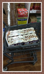 缶コーヒーを購...