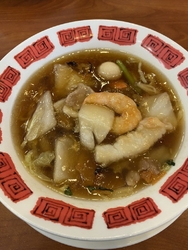 新聞広告に生活...