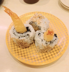 お寿司を食べに...