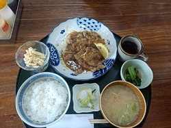 携帯で調べて評...