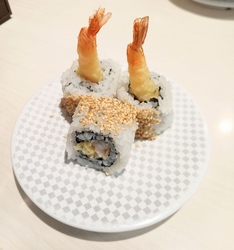 お寿司を食べに...